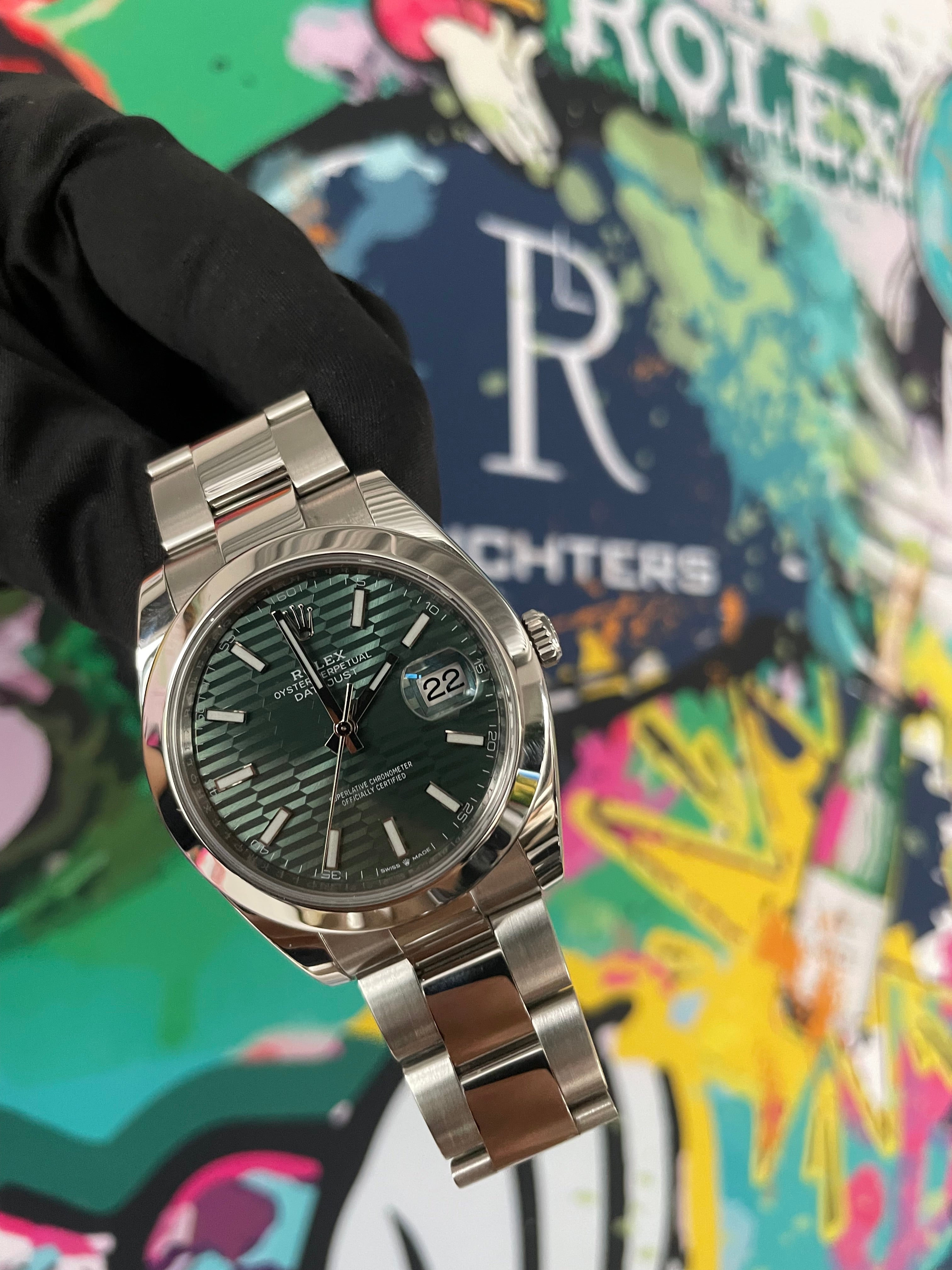 Rolex Datejust 41 | 126300 grün motif oyster | 2022 | full set